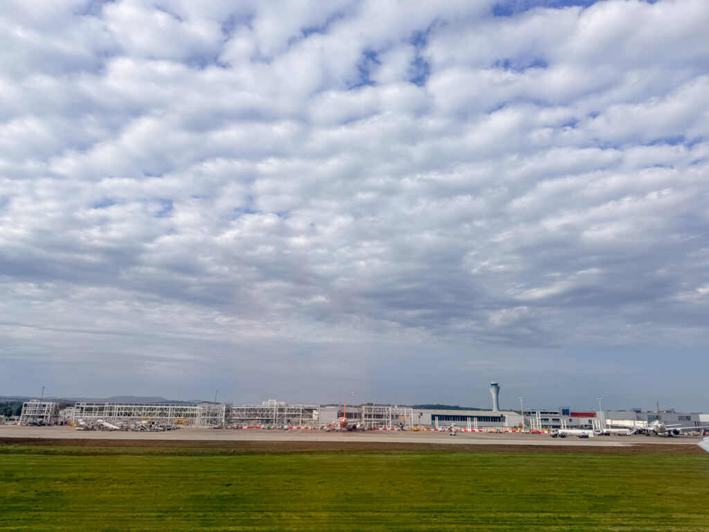 Edinburgh's airport. JOHN's flight went from there to ZURICH to Toronto landing two hours after me. He booked on points.