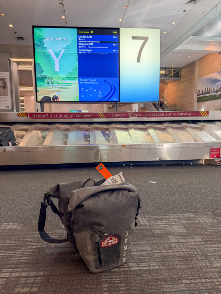 Because of delays, my baggage didn't make it onto my second flight. But John was landing two hours later and....